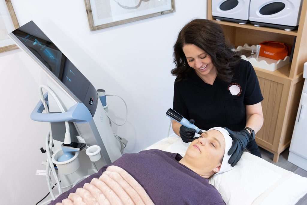 Jacci performing an Exion face treatment at The Effortless Clinic in Gungahlin